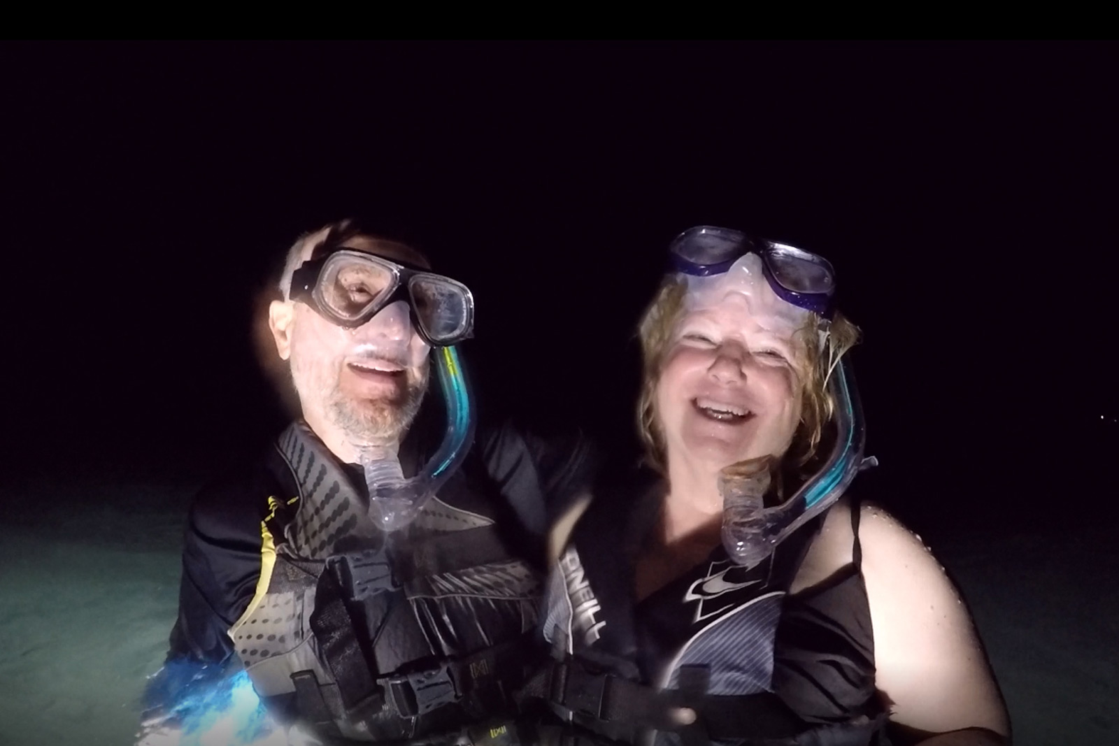 Two happy snorkelers after a successful manta ray swim